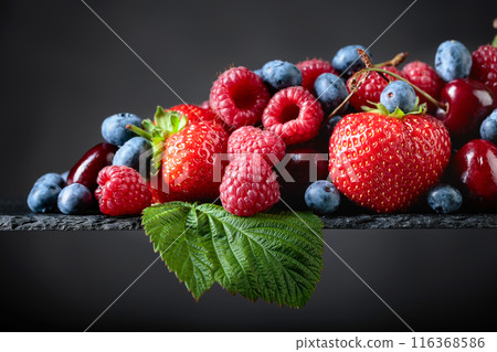 Berries closeup colorful assorted mix. 116368586