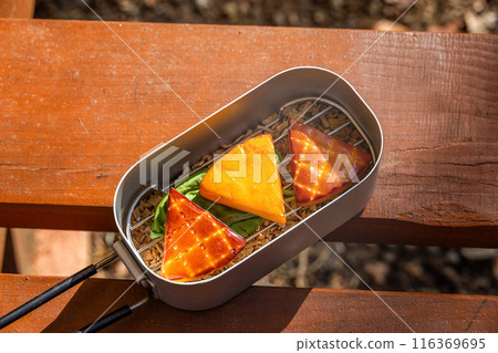 Homemade smoked food at the campsite 116369695