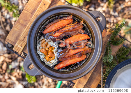 Homemade smoked food at the campsite Homemade smoked food at the campsite 116369698