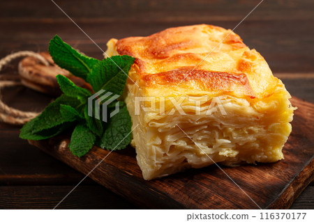 Achma, khachapuri, Georgian cuisine, homemade, no people, on a wooden background, 116370177