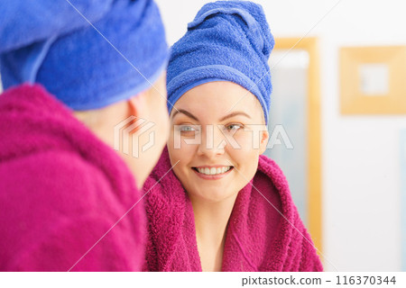 Woman in towel after shower Woman in towel after shower 116370344