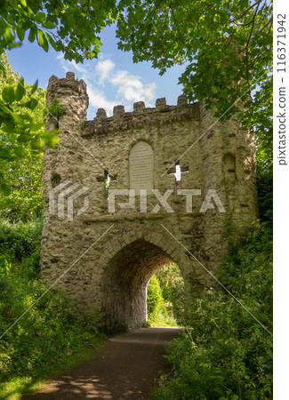 Castle Grounds, a public park in Reigate, Surrey, UK. While the castle no longer exists, a mock medieval gateway was built over the ruins in 1777. 116371942