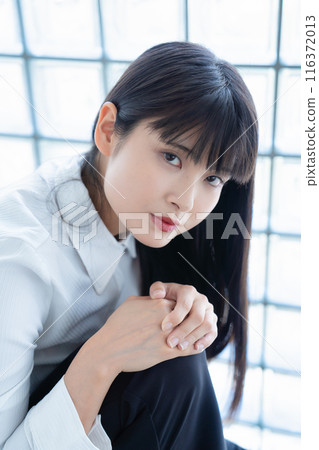 Fashionable young woman Fashionable young woman 116372013