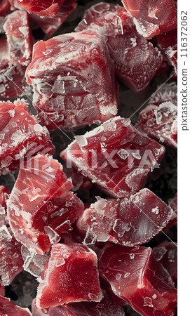 Close Up Of Frozen Raw Meat Cubes With Ice 116372062