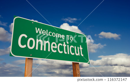 Welcome To Connecticut Green Road Sign Over Blue Sky with Some Clouds. Welcome To Connecticut Green Road Sign Over Blue Sky with Some Clouds. 116372147