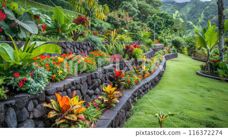 Beautiful design of tropical home garden with terraces, landscaped backyard or yard, stone retaining walls in summer. Concept of landscaping, plant, greenery, flower 116372274