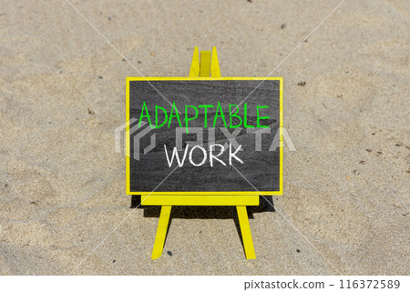 Adaptable work symbol. Concept words Adaptable work on beautiful yellow blackboard. Beautiful sand beach background. Business Adaptable work concept. Copy space. 116372589