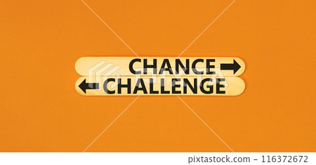 Challenge or chance symbol. Concept word Challenge or Chance on beautiful wooden stick. Beautiful orange table orange background. Business and challenge or chance concept. Copy space. 116372672