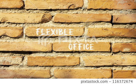 Flexible office symbol. Concept words Flexible office on beautiful brick wall. Beautiful red brown brick wall background. Business Flexible office concept. Copy space. Flexible office symbol. Concept words Flexible office on beautiful brick wall. Beautiful red brown brick wall background. Business Flexible office concept. Copy space. 116372674