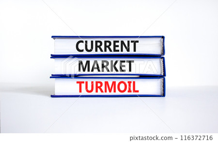 Current market turmoil symbol. Concept words Current market turmoil on books on a beautiful white table white background. Business, finacial current market turmoil concept. 116372716
