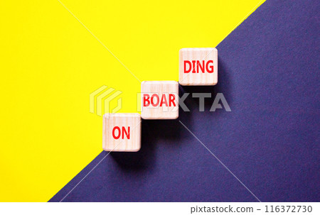 Onboarding success symbol. Concept word Onboarding on wooden blocks. Beautiful yellow and black background. Business onboarding success concept. Copy space. 116372730