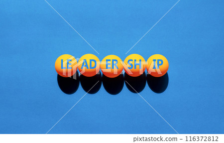 Leadership symbol. Concept word Leadership on beautiful yellow ping pong balls. Beautiful blue background. Business leadership concept. Copy space. Leadership symbol. Concept word Leadership on beautiful yellow ping pong balls. Beautiful blue background. Business leadership concept. Copy space. 116372812