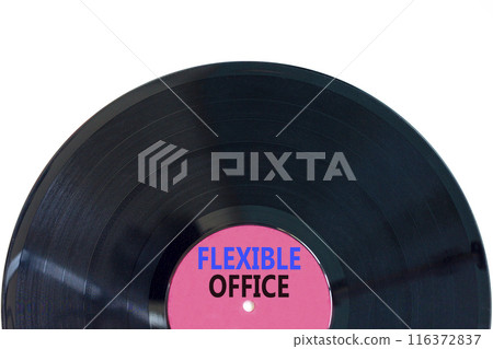 Flexible office symbol. Concept words Flexible office on beautiful purple black vinyl disk. Beautiful white paper background. Business Flexible office concept. Copy space. 116372837