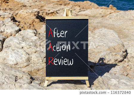 AAR After action review symbol. Concept words AAR After action review on beautiful yellow blackboard. Beautiful stone blue sky sea background. Business AAR after action review concept. Copy space. AAR After action review symbol. Concept words AAR After action review on beautiful yellow blackboard. Beautiful stone blue sky sea background. Business AAR after action review concept. Copy space. 116372840