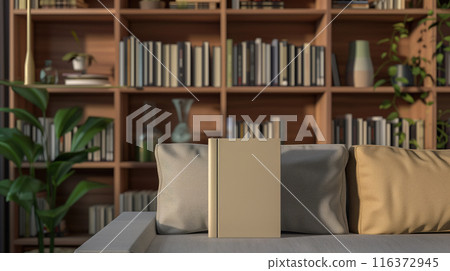 Hardcover big book mockup of light color on a sofa and stylish dark bookshelf with many other books in the background Hardcover big book mockup of light color on a sofa and stylish dark bookshelf with many other books in the background 116372945