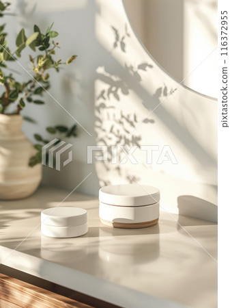 Elegant and minimalist bathroom setup showcasing a skincare jar mockup, illuminated by warm natural light for a fresh, inviting look Elegant and minimalist bathroom setup showcasing a skincare jar mockup, illuminated by warm natural light for a fresh, inviting look 116372955