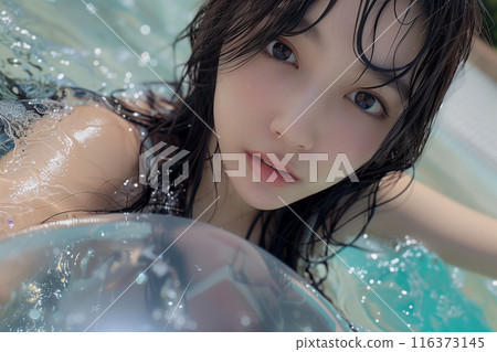 Cute woman enjoying the pool 116373145