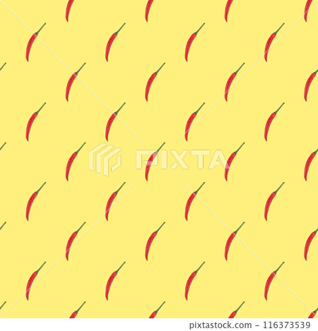 Seamless pattern of red hot chili pepper on a yellow background. Top view 116373539