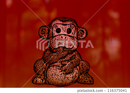 Monkey figurine on a red background. A lonely sitting monkey holds a finger in its mouth. Monkey figurine on a red background. A lonely sitting monkey holds a finger in its mouth. 116375041