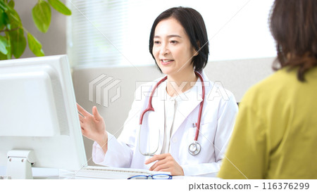 Middle-aged female doctor to see 116376299