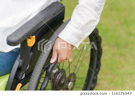 Part cut of a woman in a wheelchair 116376947