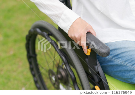 Part cut of a woman in a wheelchair 116376949