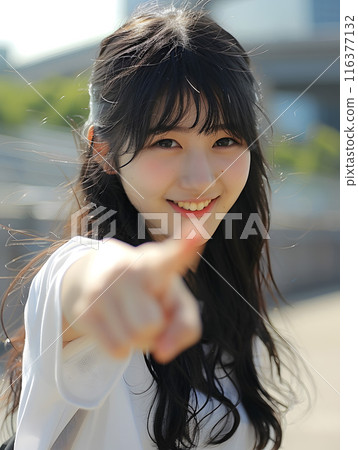 Asian woman pointing 116377132