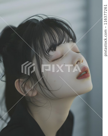 Asian woman with eyes closed waiting for a kiss 116377261