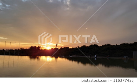 Sunset on the surface of the water Sunset on the surface of the water 116377453