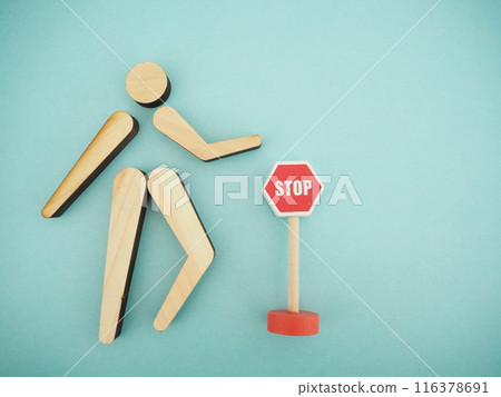 Doll on a stop sign, copy space 116378691