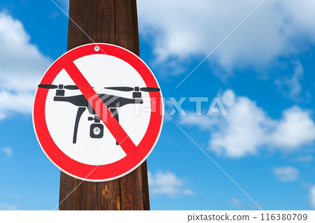 Ban on flying drones. Crossed out flying drone sign. Restrictions on copter flights concept 116380709
