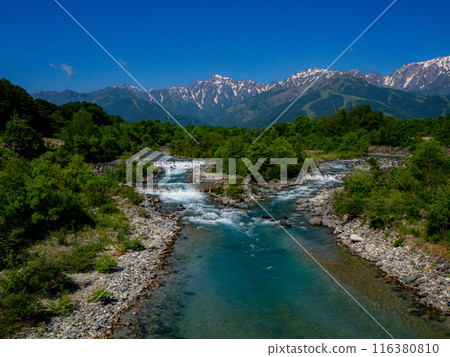 Snow-covered Northern Alps and Matsukawa River, Hakuba Village, Nagano Prefecture 116380810