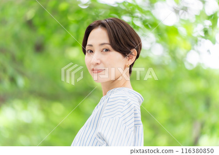 Fresh greenery Middle-aged woman Beauty 116380850