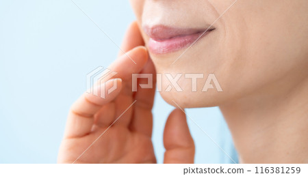 Women's mouth, 50s, nasolabial folds 116381259