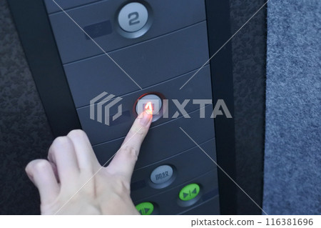 Press the elevator button 116381696