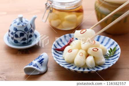 Pickled scallions in sweet vinegar made by my grandmother 116382557