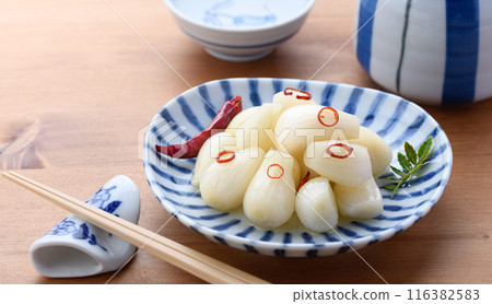 Pickled scallions in sweet vinegar made by my grandmother 116382583