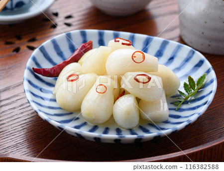 Pickled scallions in sweet vinegar made by my grandmother 116382588