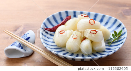 Pickled scallions in sweet vinegar made by my grandmother 116382605