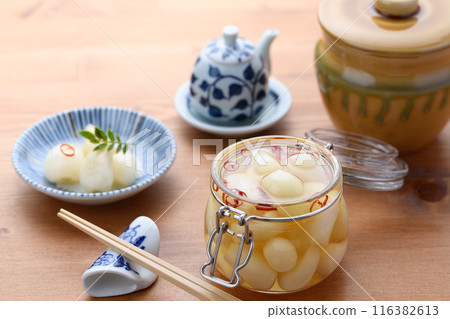 Pickled scallions in sweet vinegar made by my grandmother Pickled scallions in sweet vinegar made by my grandmother 116382613