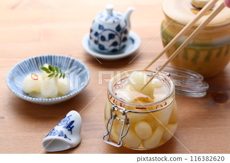 Pickled scallions in sweet vinegar made by my grandmother 116382620