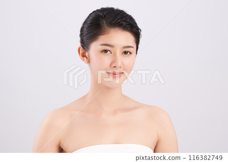 Beautiful young asian woman with clean fresh skin on white background, Face care, Facial treatment, Cosmetology, beauty and spa, Asian women portrait. Beautiful young asian woman with clean fresh skin on white background, Face care, Facial treatment, Cosmetology, beauty and spa, Asian women portrait. 116382749