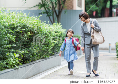 A family going to school together. A family going to school together. 116382927