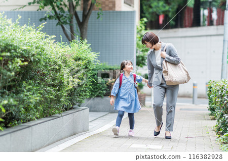 A family going to school together. A family going to school together. 116382928