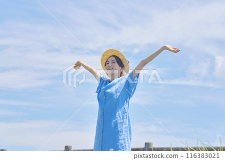 A woman stretching outdoors A woman stretching outdoors 116383021