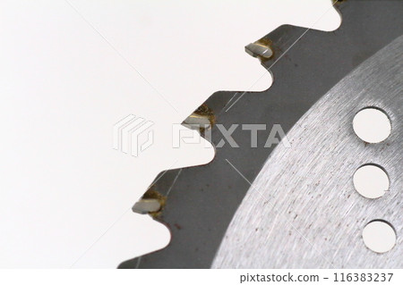 Close-up of a tipped saw for a grass trimmer Close-up of a tipped saw for a grass trimmer 116383237
