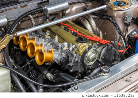 engine compartment of a old vehicle 116383282