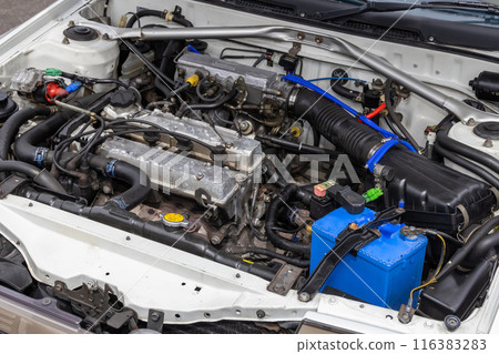 engine compartment of a old vehicle 116383283