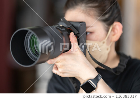 Photographer woman camera Photographer woman camera 116383317