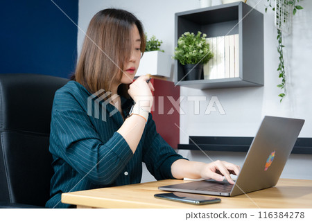asian woman use laptop for working her business from home asian woman use laptop for working her business from home 116384278